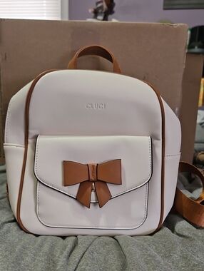 Cluci Cream Mini Backpack with Tan Bow Accent
